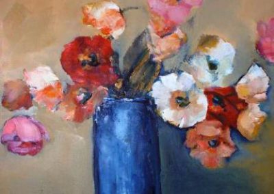 Blue vase of poppies